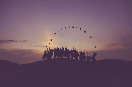 The Last Lesson by Do Thi Dieu Ngoc graduates throwing caps in the air