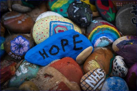 painted rocks, one with the words HOPE on it