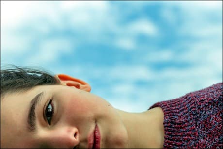 a person's head laying sideways