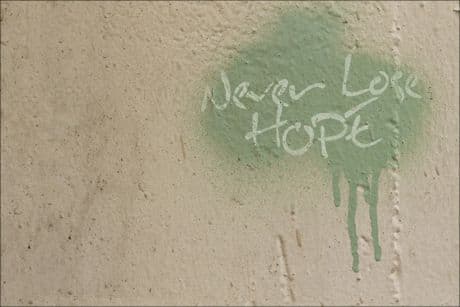 graffiti on a wall - never lose hope