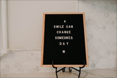 Inspirational Picture A smile can change someone's day sign