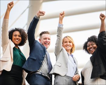 What Separates Success From Failure? people with their hands in the air