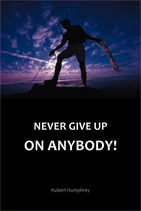 standing on a cliff, lowering a rope